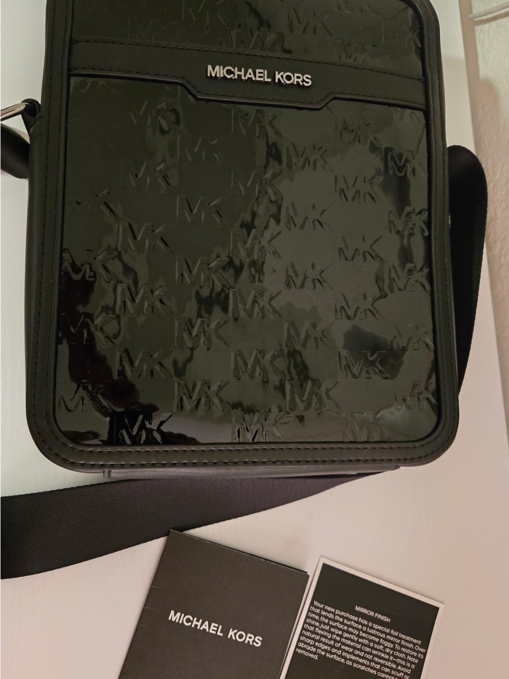 Michael Kors Black Patent MK-Embossed Messenger Bag
